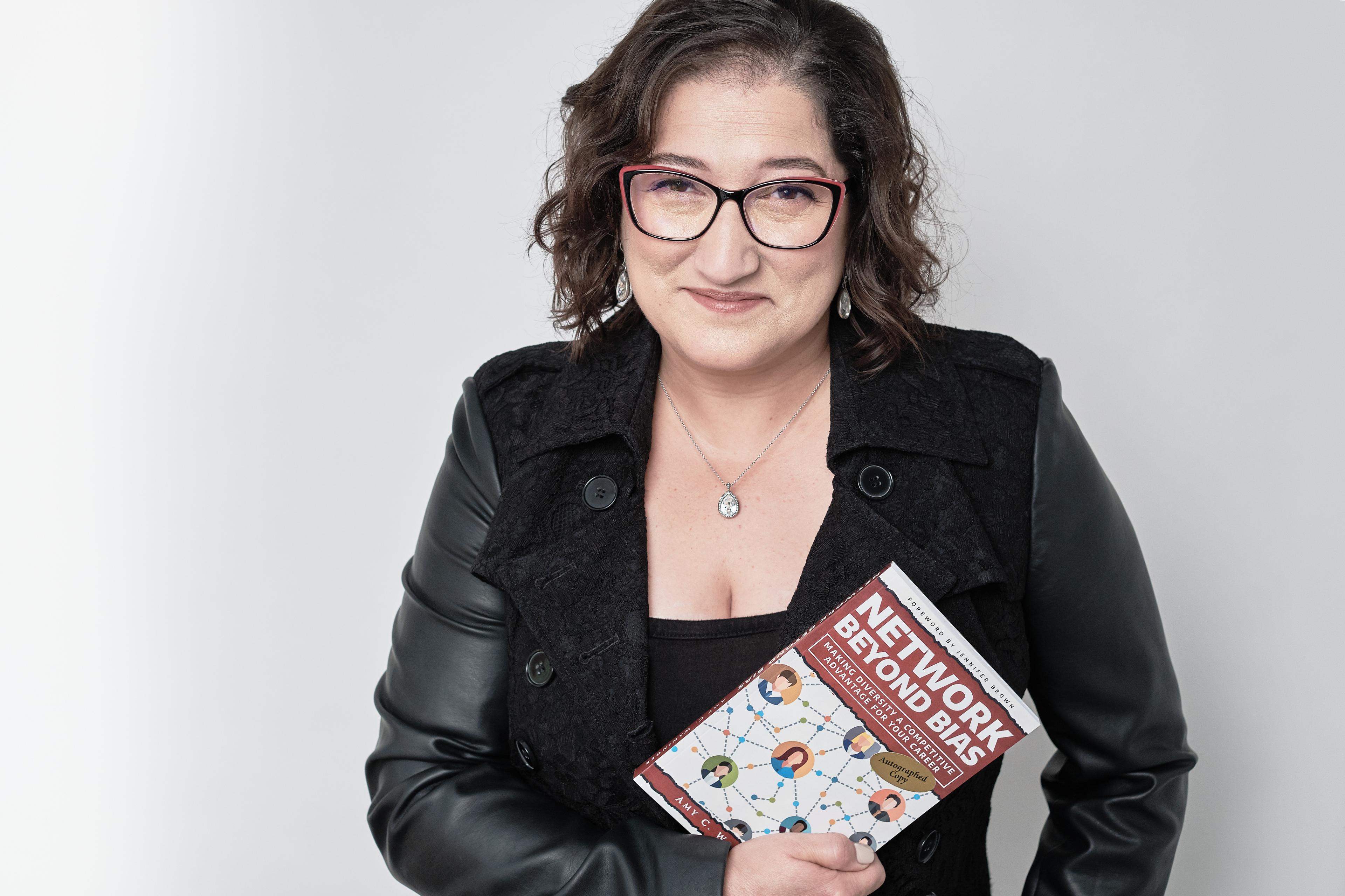 Headshot with Book 2