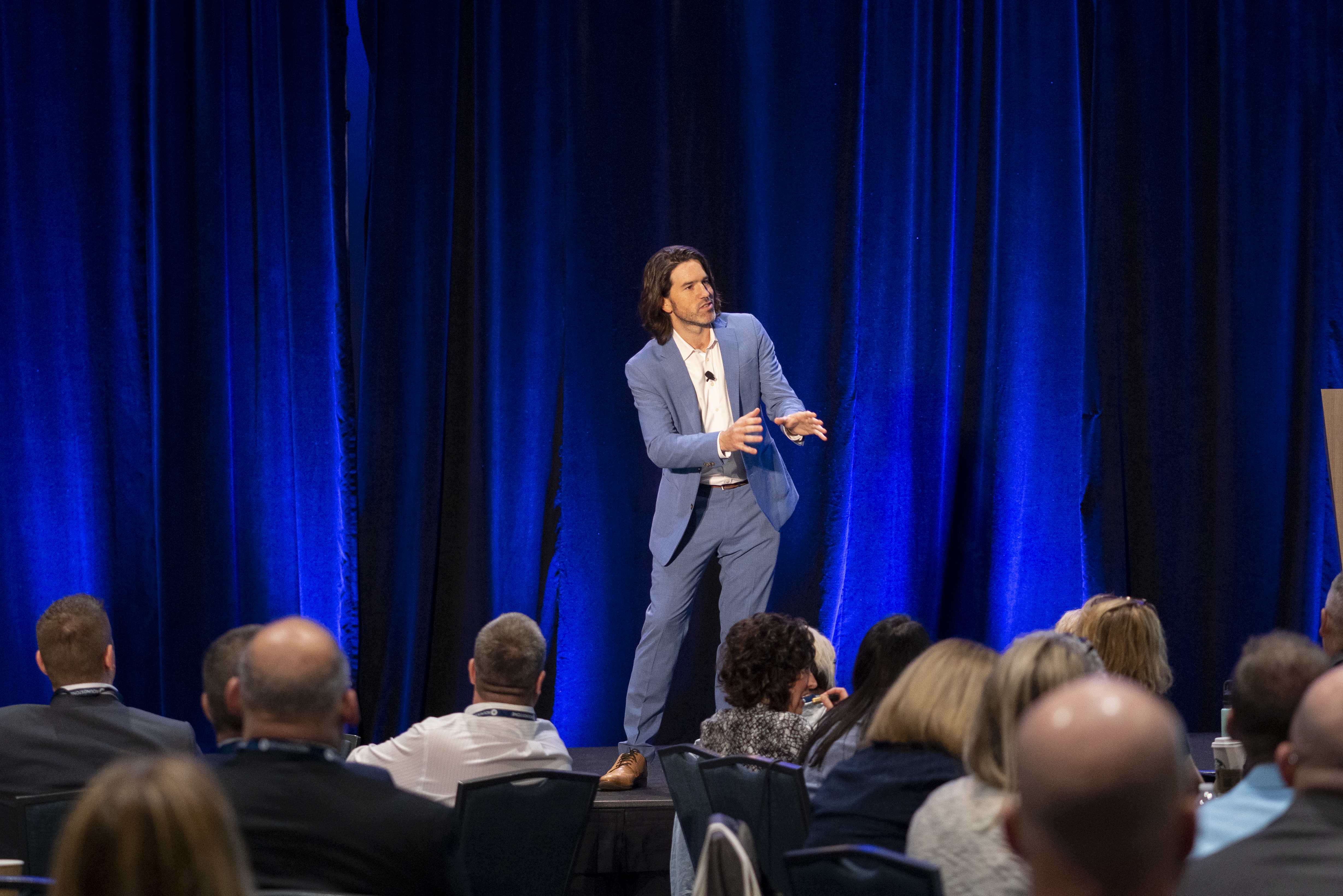 Joshua presenting a keynote presentation