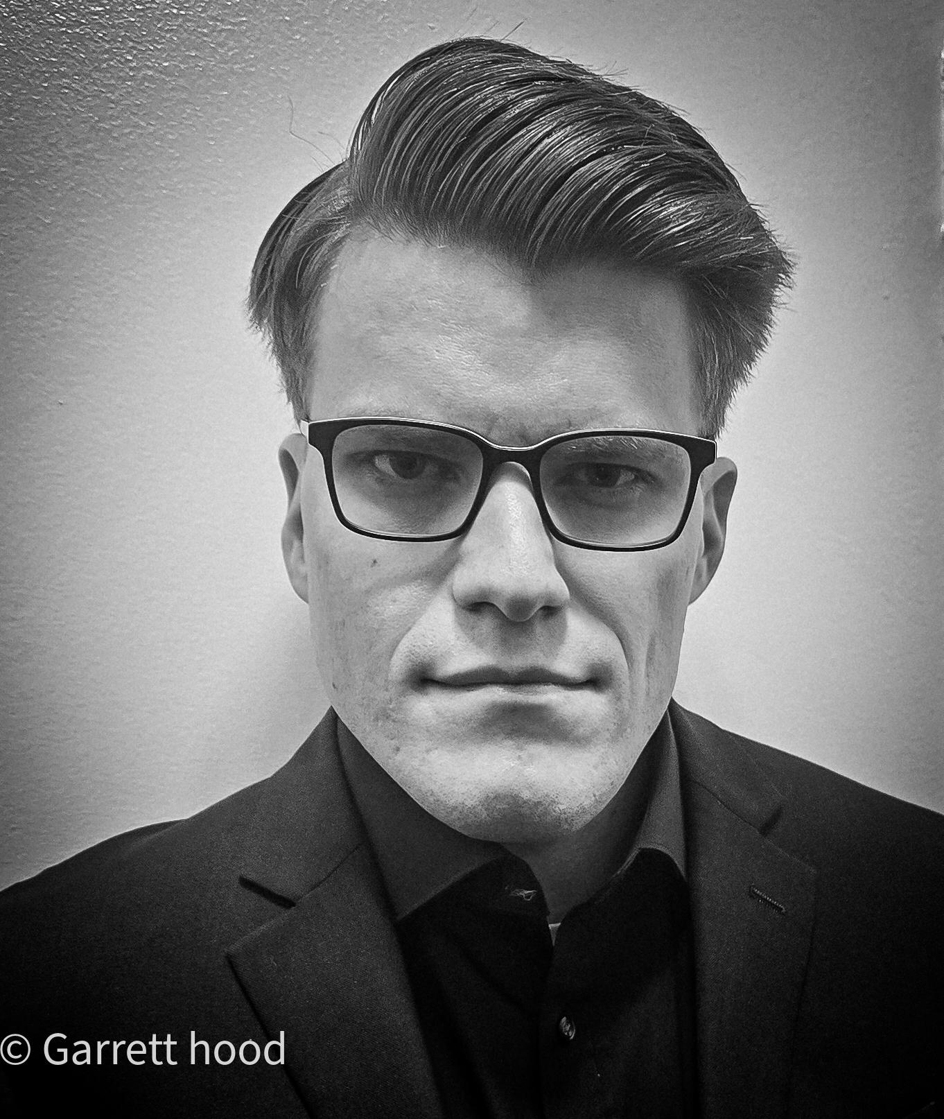 black and white headshot of jimmy clare